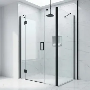 Frameless corner shower enclosure wrapping a 90-degree corner with matte black hardware and white marble tile